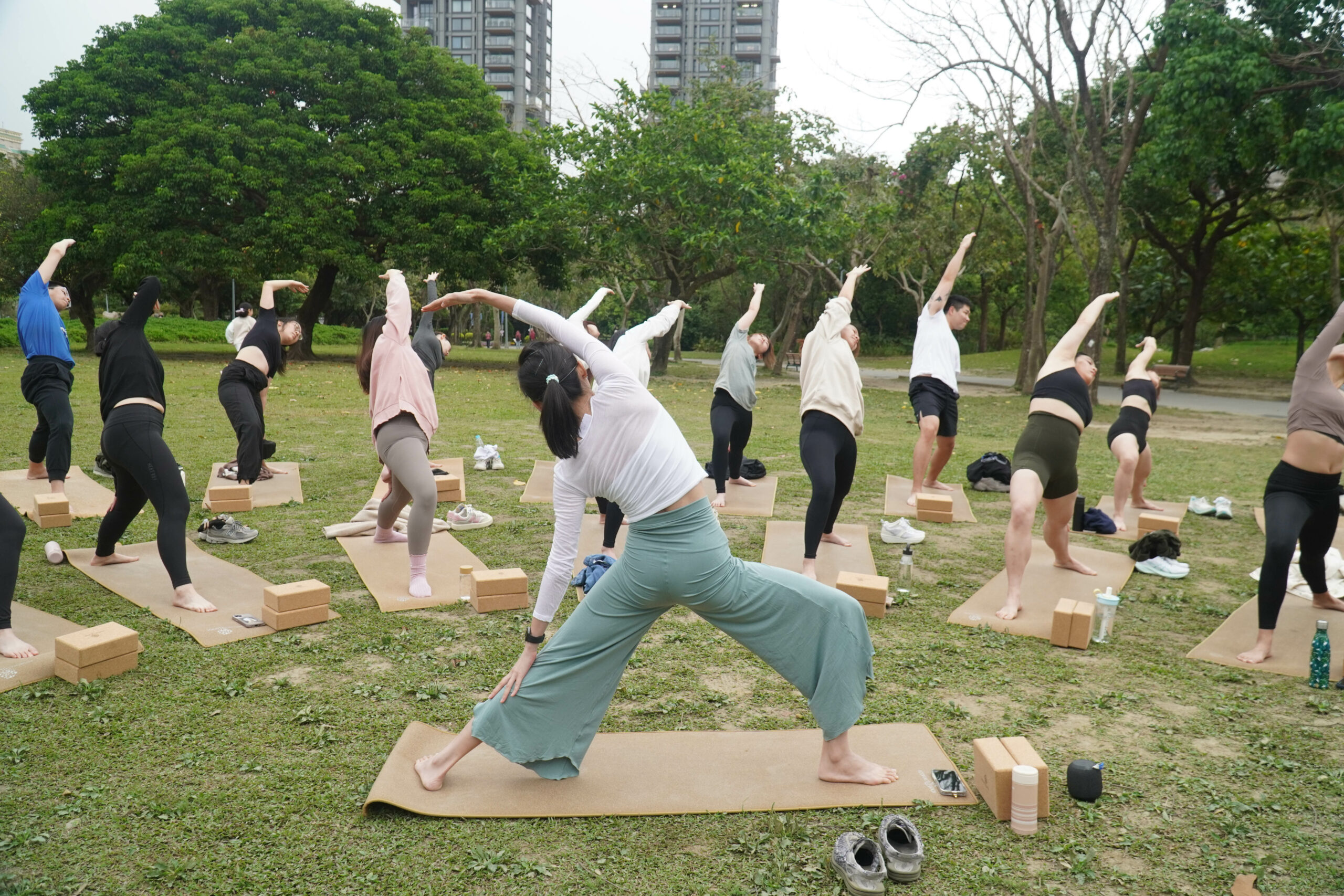 Woman practicing yoga at sunset